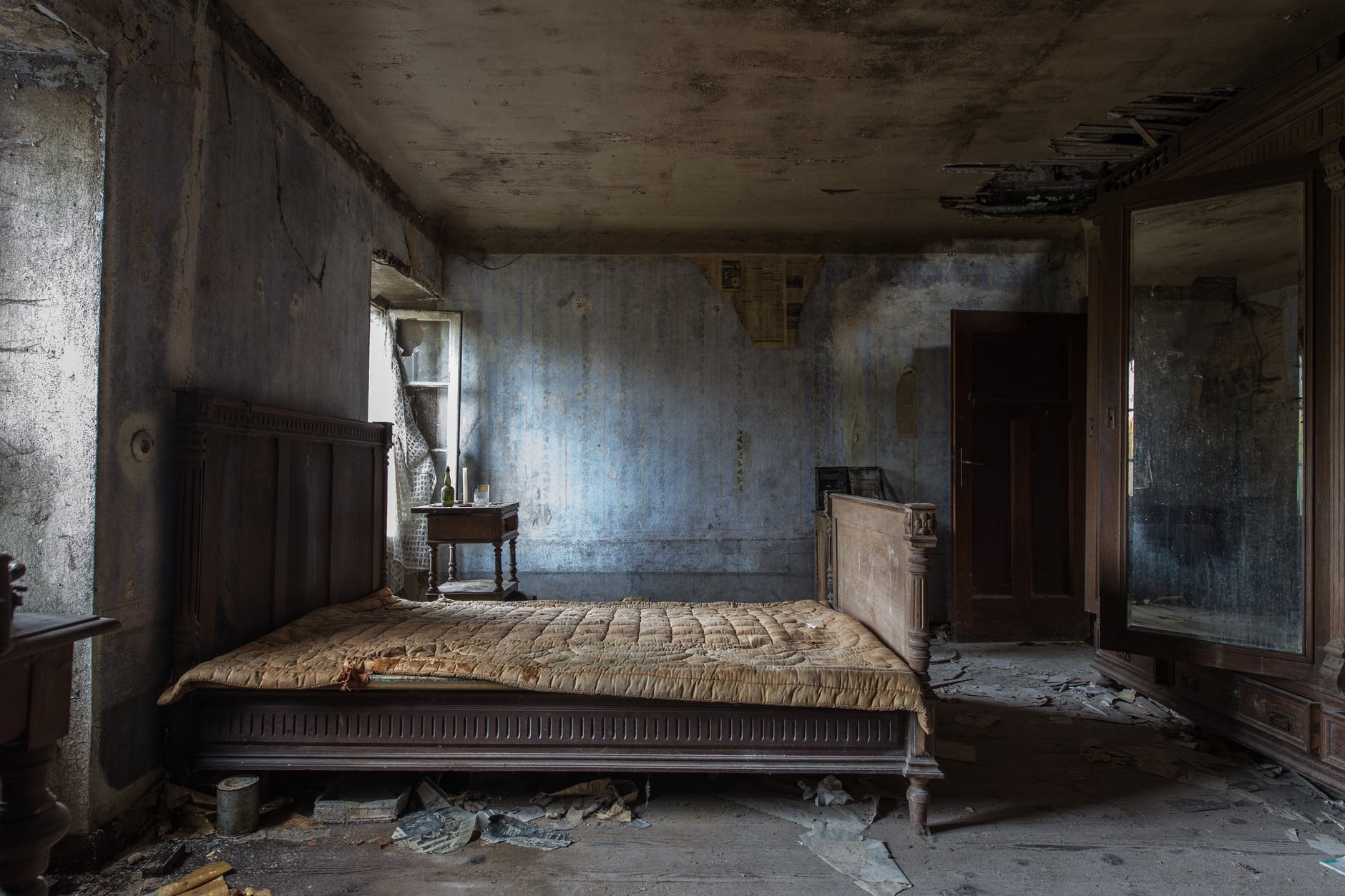 empty damaged room with mattress
